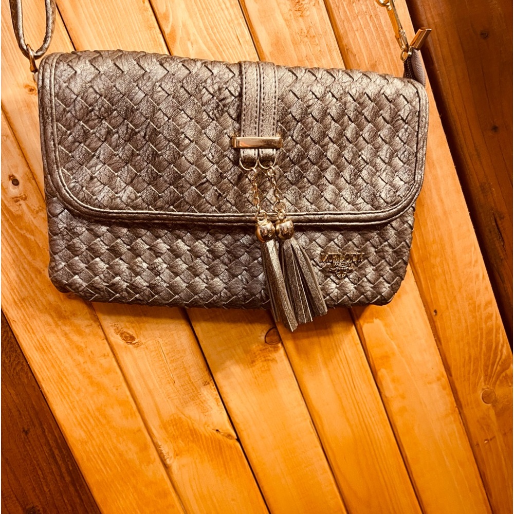 Beautiful rare MELODY crossbody purse.